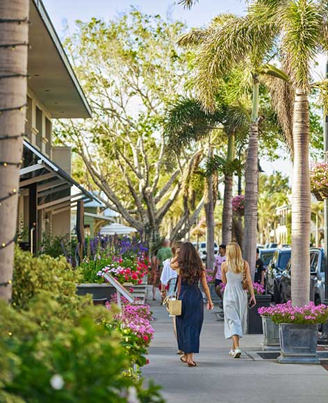 woman walking in Downtown Naples FL