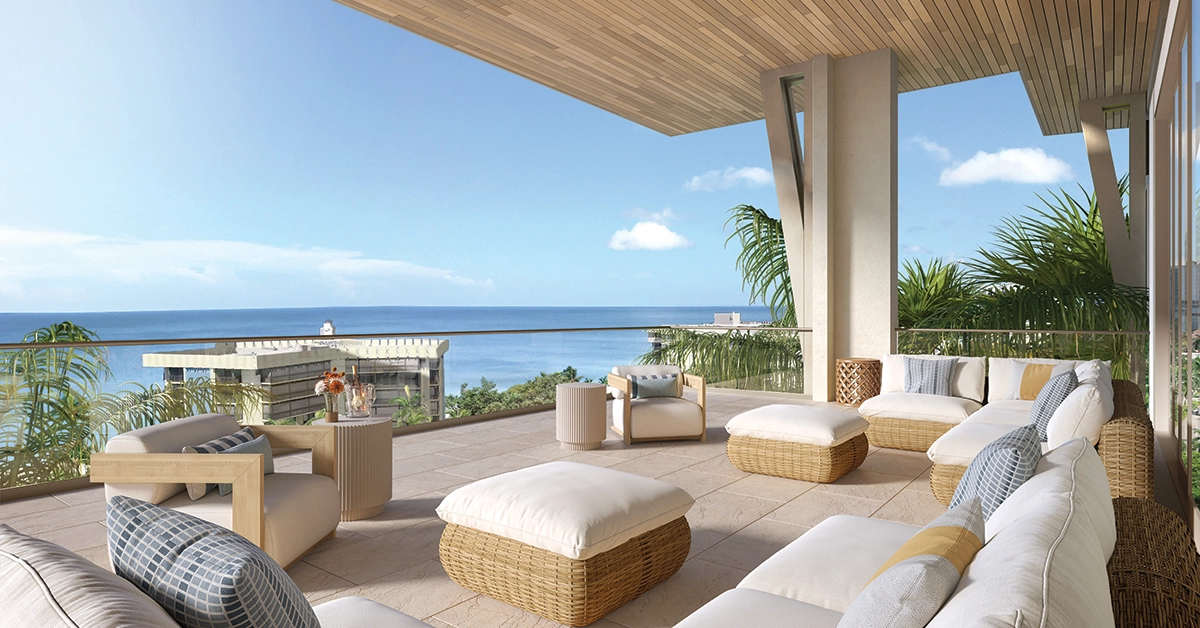 Waterfront terrace with lounge seating and panoramic ocean views