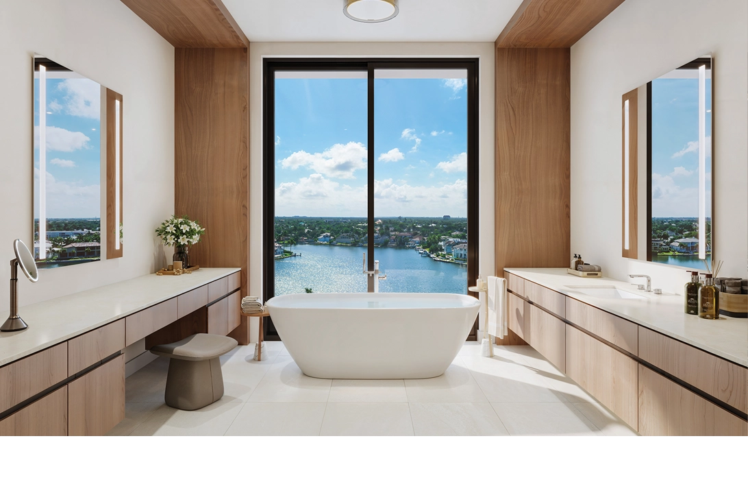 Modern luxury bathroom with freestanding tub and panoramic bay view at 3300 Gulf Shore Naples