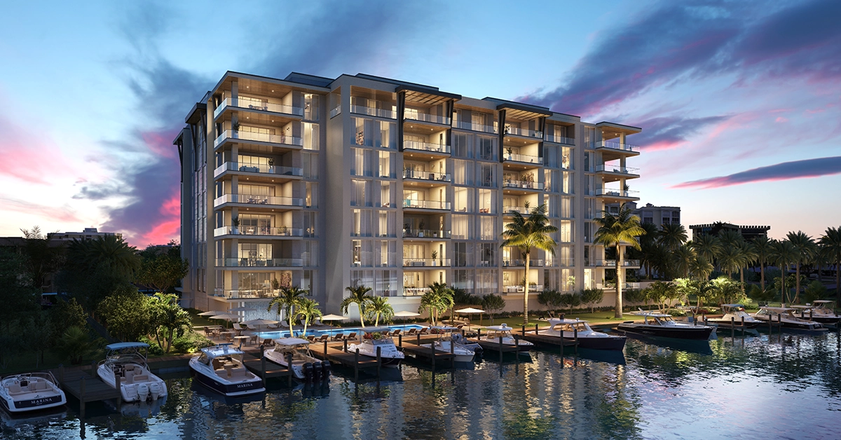 Luxury waterfront residences with private marina and boats at sunset in Naples Florida