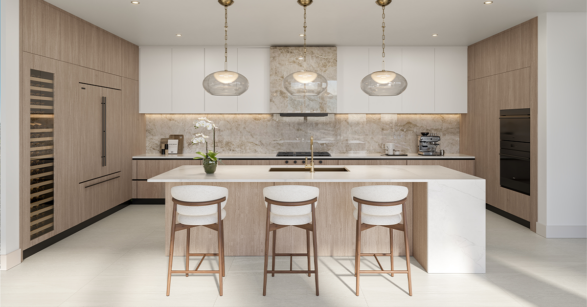 Modern kitchen with marble backsplash, island, and three bar stools under pendant lights.
